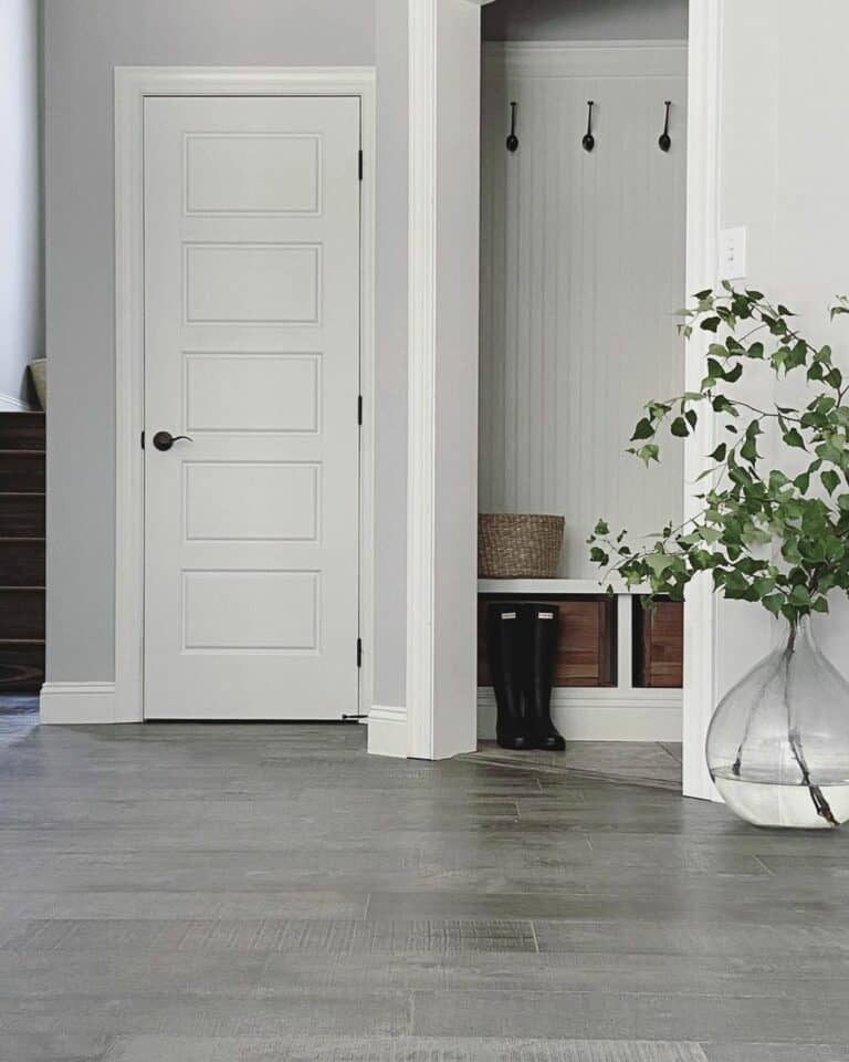32. Neutral Elegance: A Minimalist Mudroom that Speaks Volumes